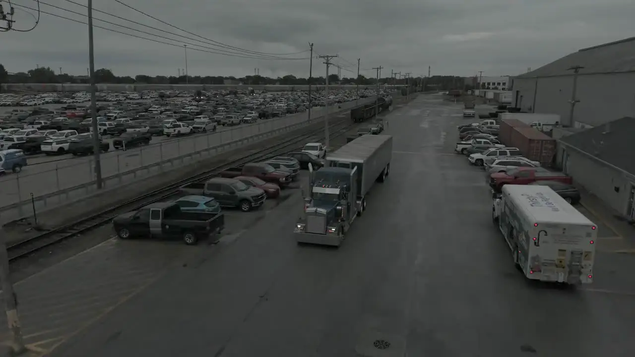 Grid-Line truck in a rail-served industrial yard, from the air